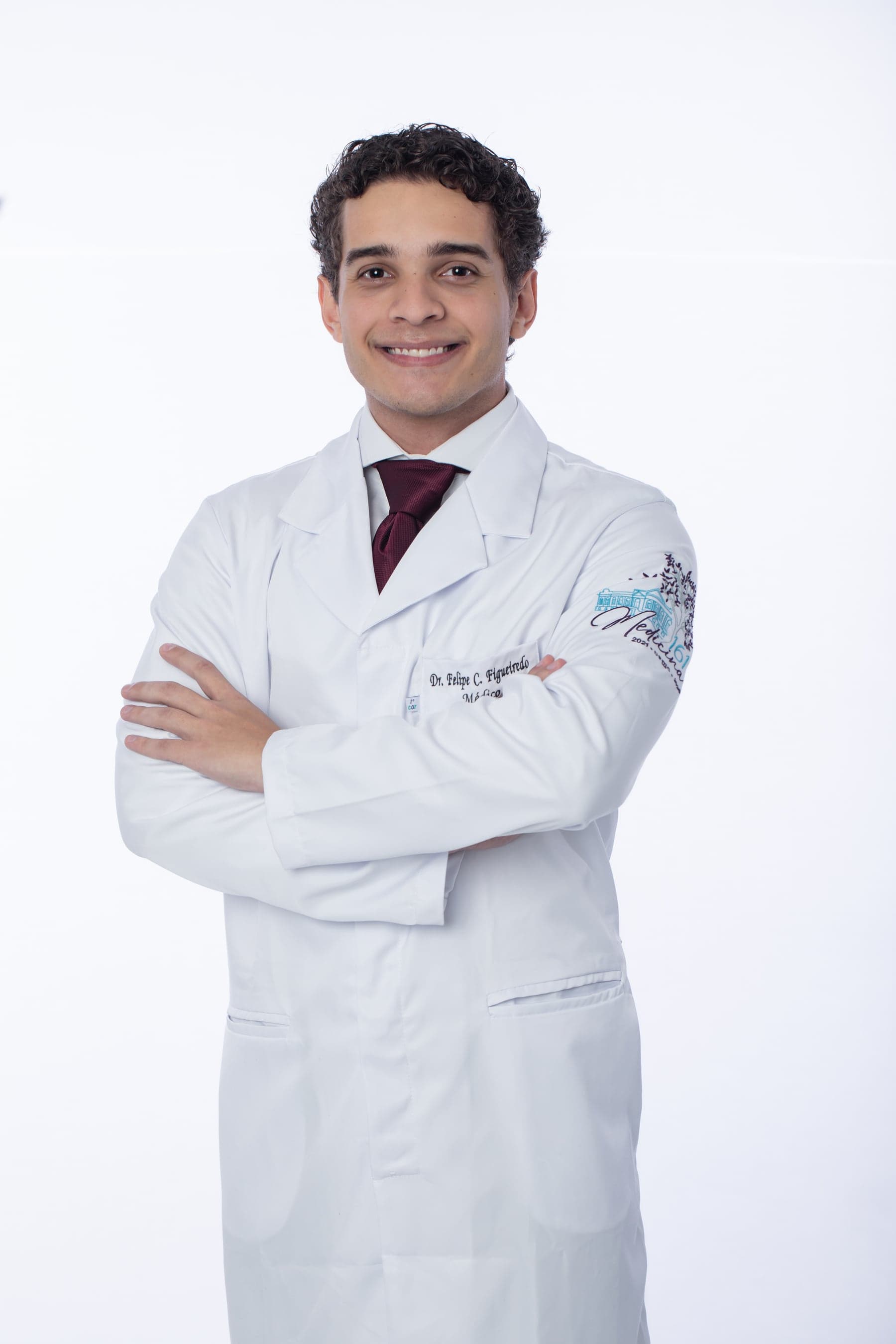 Felipe de Carvalho Figueiredo in a white coat